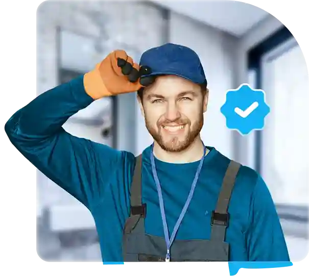 Certified technician in Dubai wearing work uniform and gloves for home maintenance services